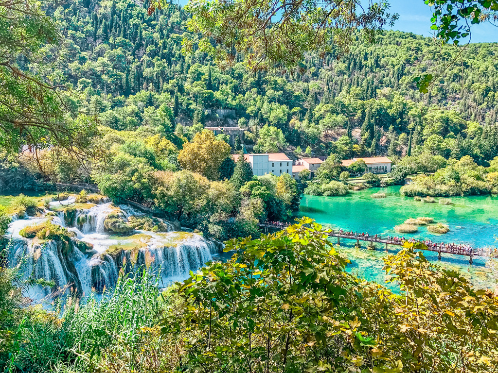 Birds Eye view of Krka national park in Croatia, the waterfall, trees in background